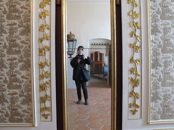 Gilded mirror at a  museum in Prague