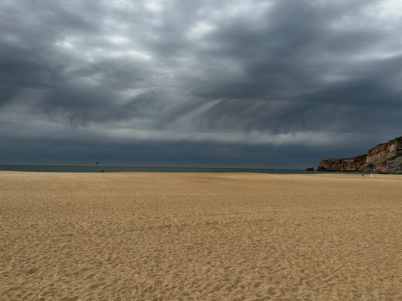 Storm brewing on the beach in Navarre, Portugal