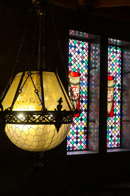 Lantern with Stained Glass in background at Palau Guell